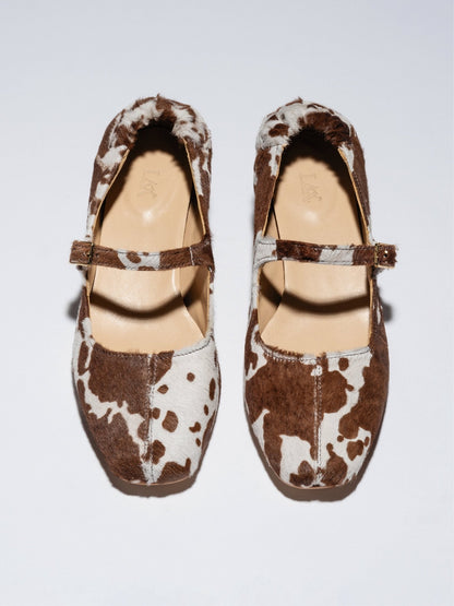 MAGGIE - JANES Cow print pony - LAX