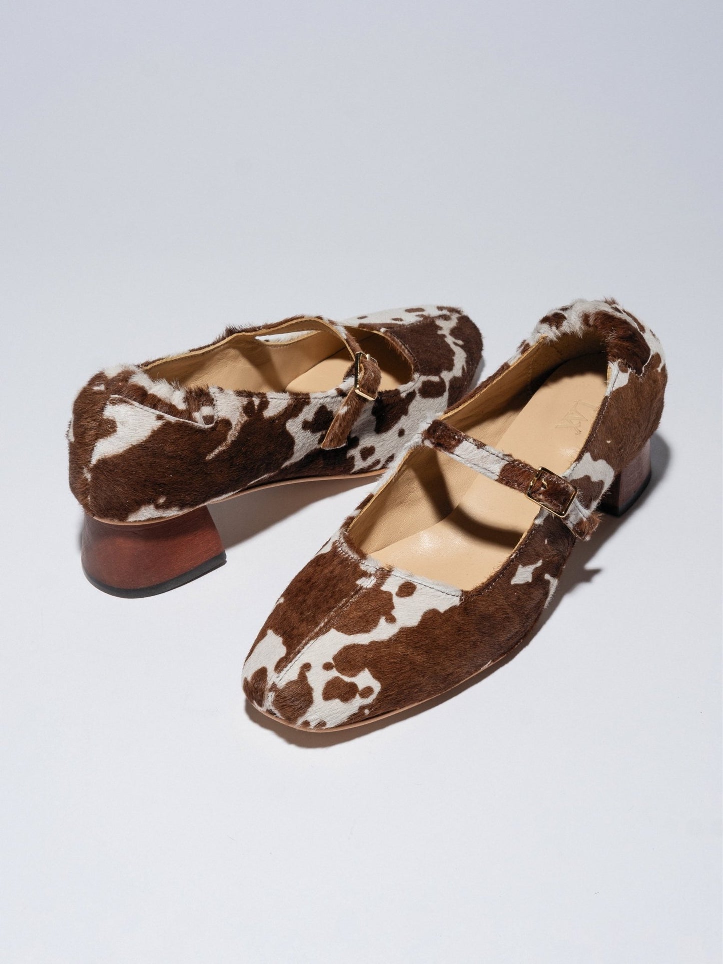 MAGGIE - JANES Cow print pony - LAX