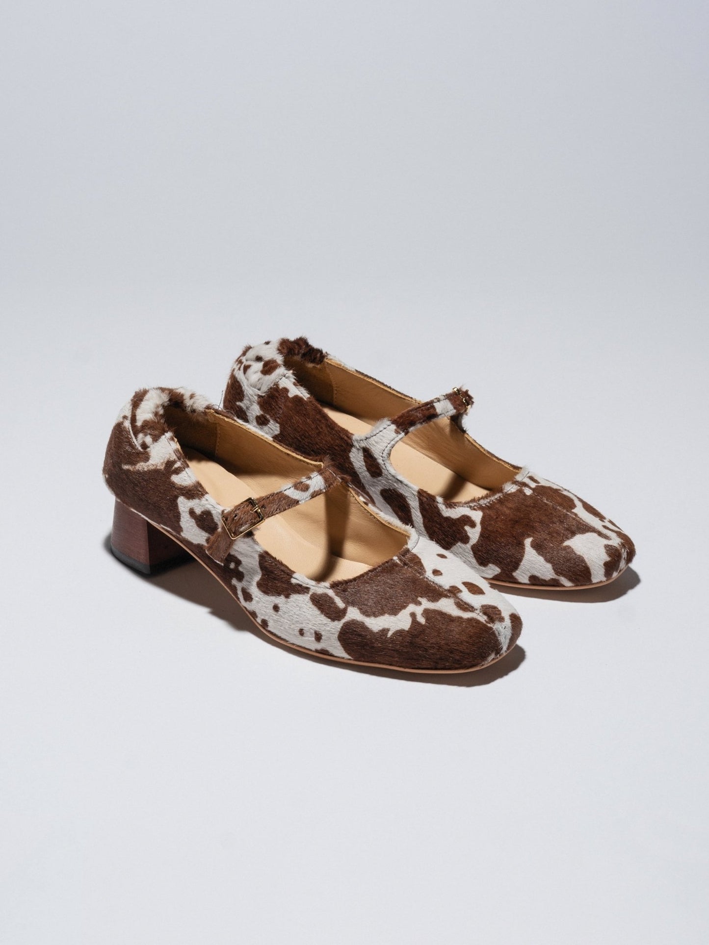 MAGGIE - JANES Cow print pony - LAX